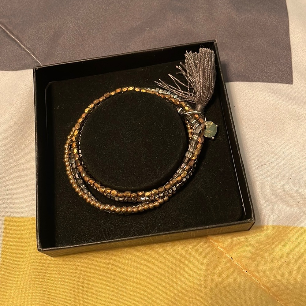 Gorgeous sliver tone and gold tone beaded bracelet